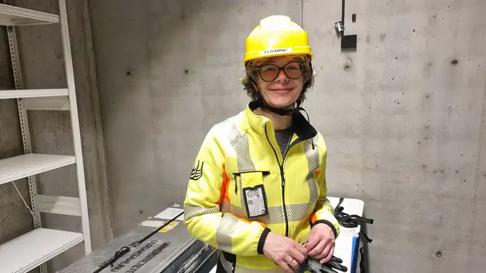 A woman smiling to the camera