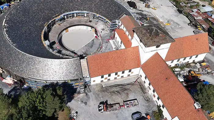 Overview of the construction site containing the new building and the old Viking Ship Museum.