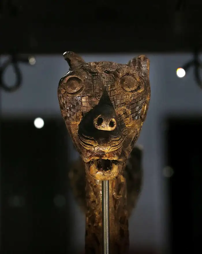 Close up of an animal head post